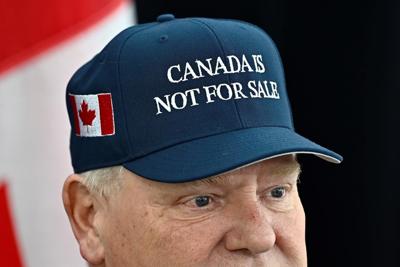 Doug Ford wears 'Canada is not for sale' cap for tariff talk