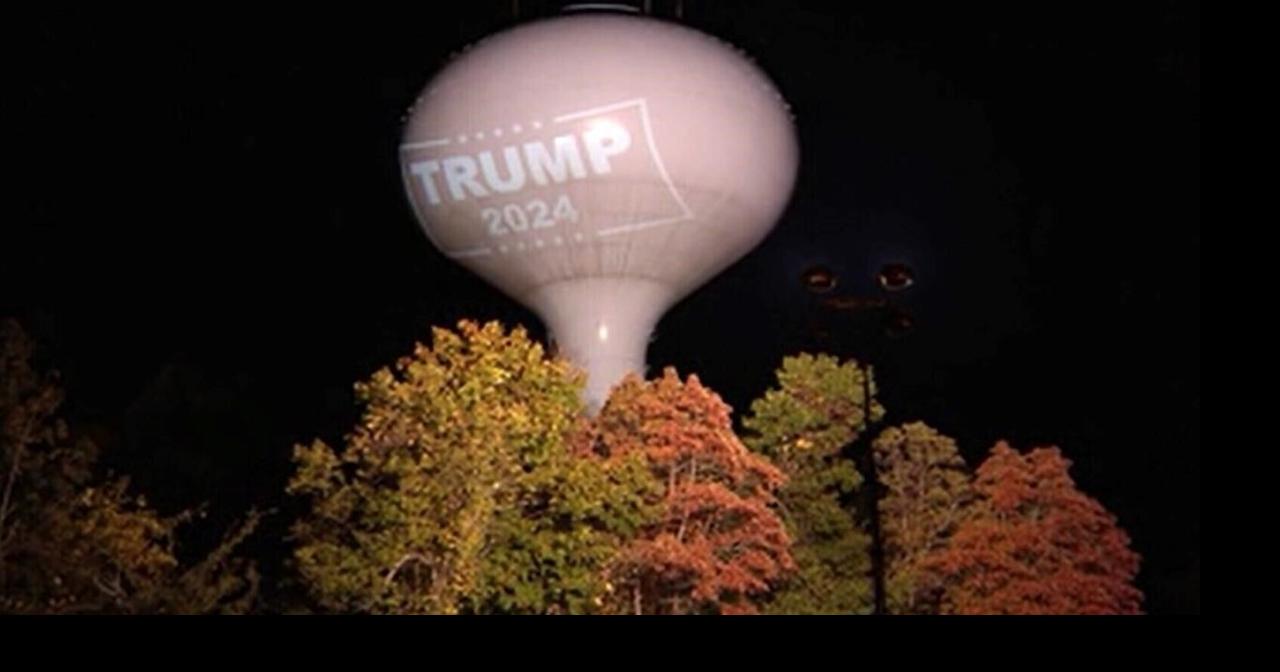 Town fines resident who projected Trump sign onto municipal water tower