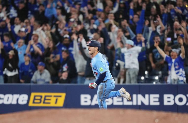 Varsho's walk-off grand slam ends Blue Jays' three-game slide