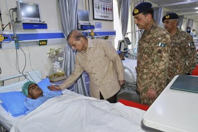 3 girls and 2 soldiers killed in Pakistan school bus bombing are buried