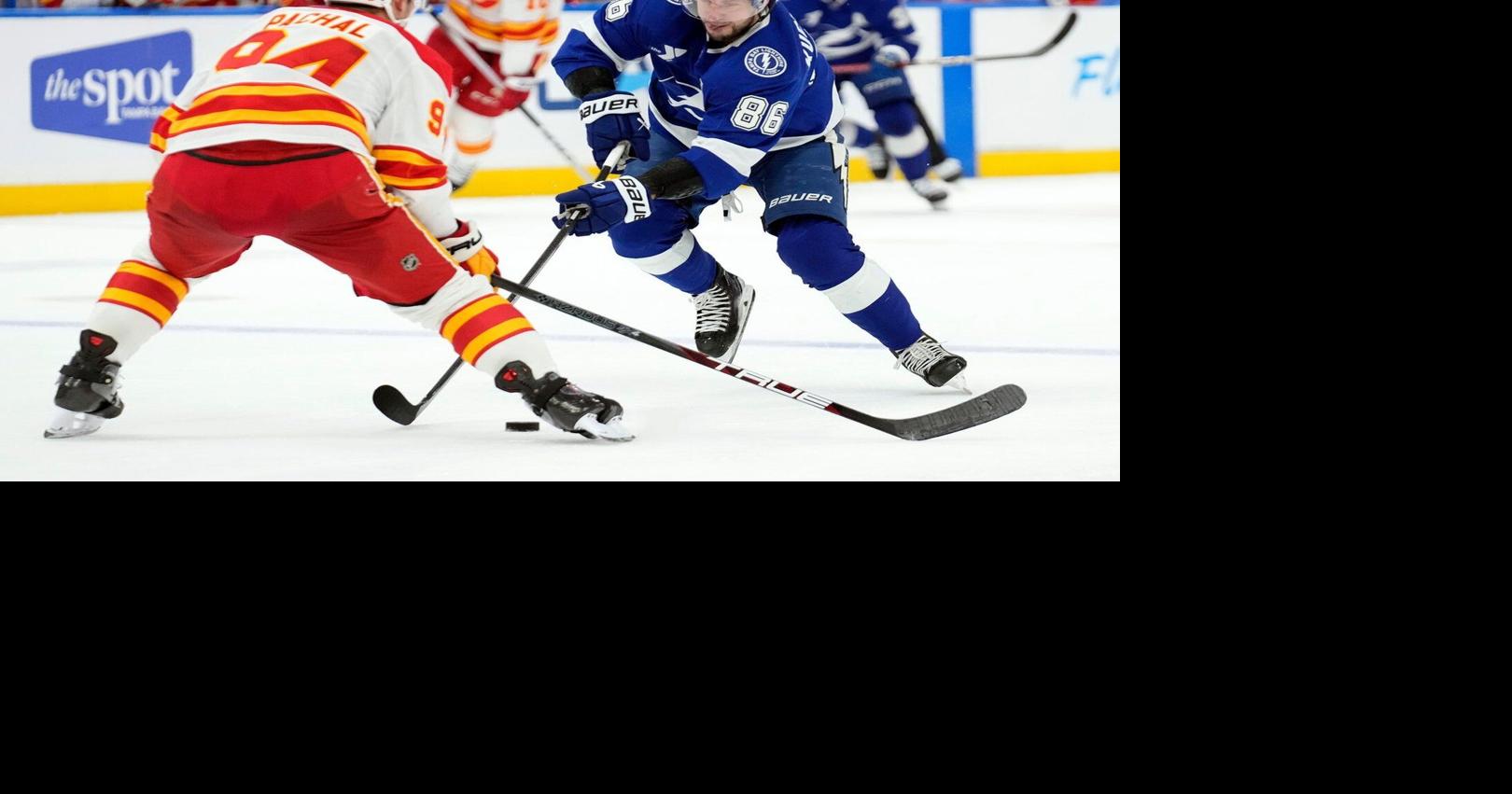 Andrei Vasilevskiy stops 32 shots, Lightning beat Flames 5-1 for 5th straight victory.