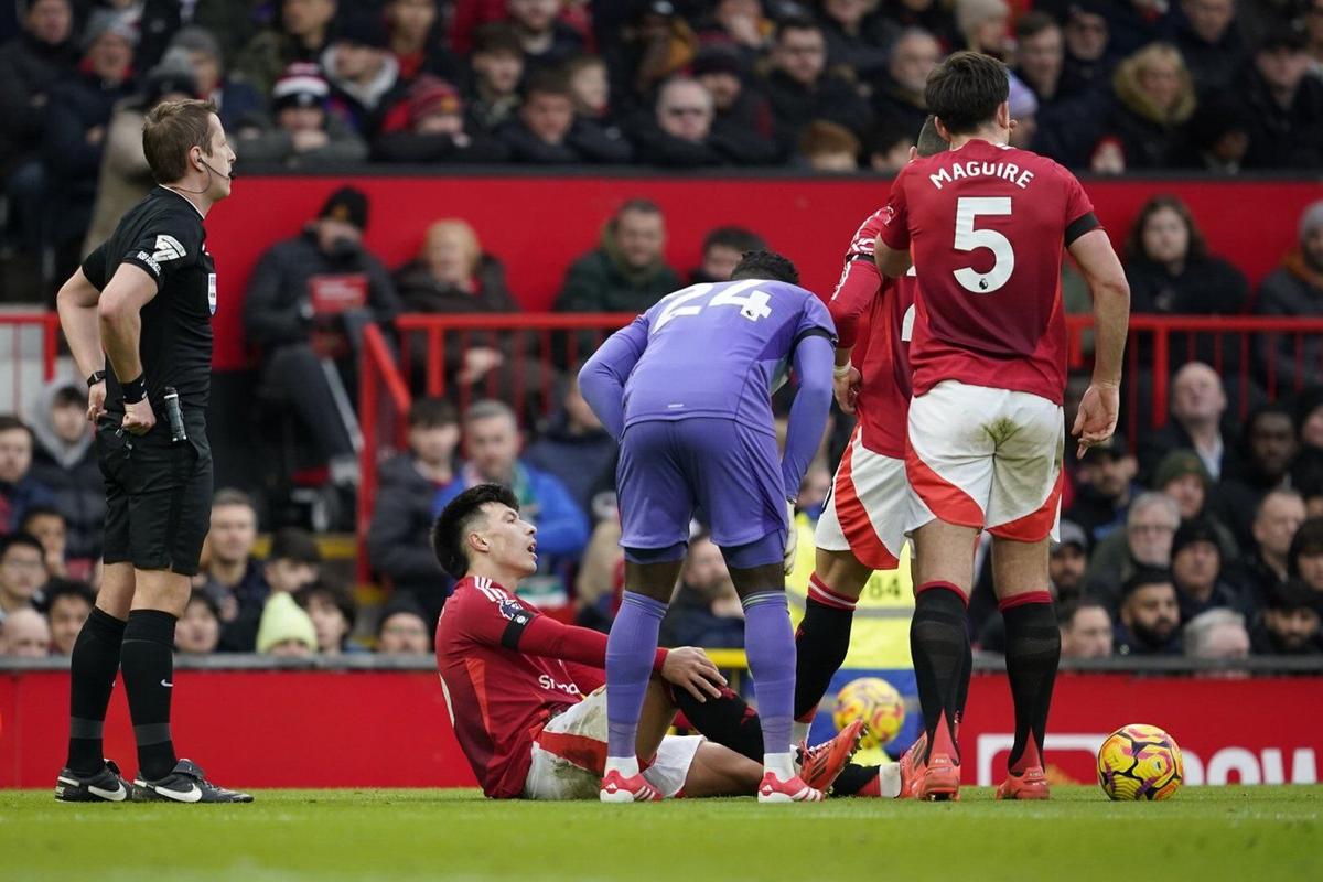 Man United defender Lisandro Martinez in tears as he is carried off on  stretcher with knee injury