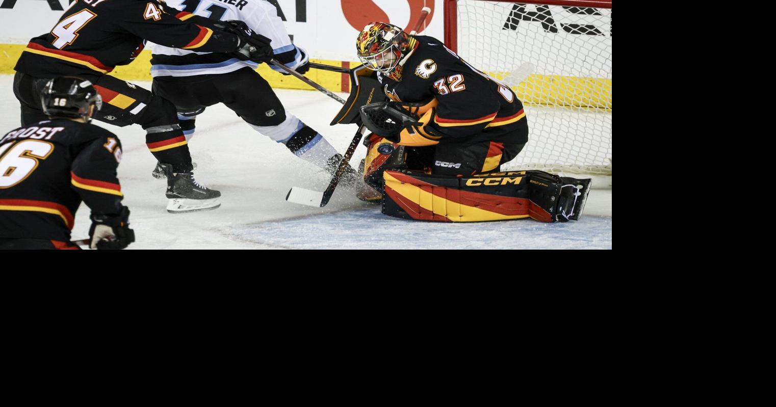 Wolf’s 28-save shutout leads Calgary Flames to 2-0 win over Utah Mammoth