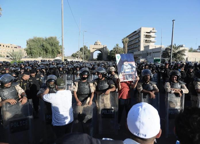 Followers of cleric enter Iraqi parliament in show of force