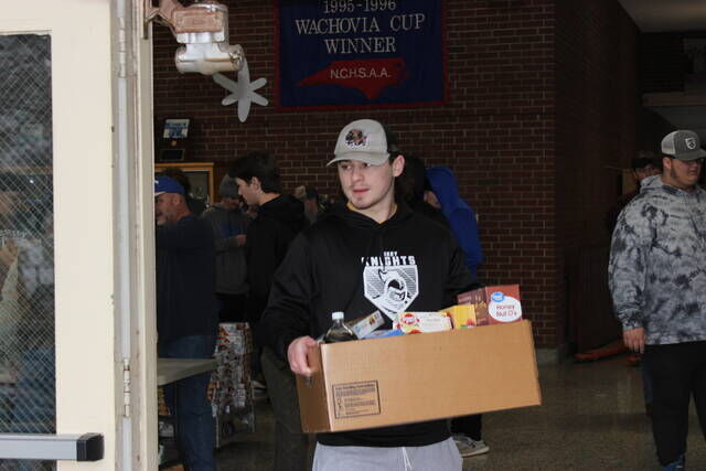 Surry Baseball Assists with Food Drive and Delivery Sports