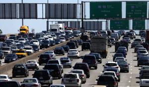 Gas prices down as drivers hit the roads for the holidays