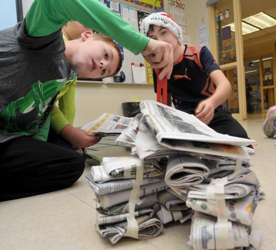Wood School students make tables out of newspapers Local News