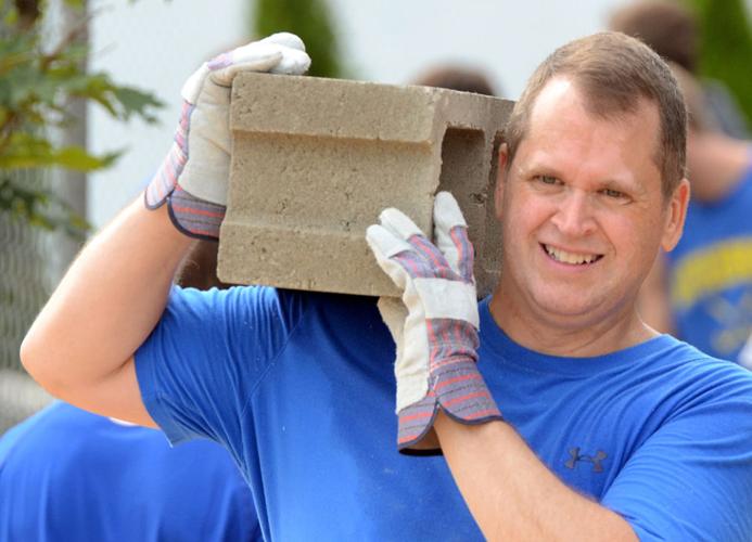 Volunteers Erect New Concession Stand at A.H.S. Gallery