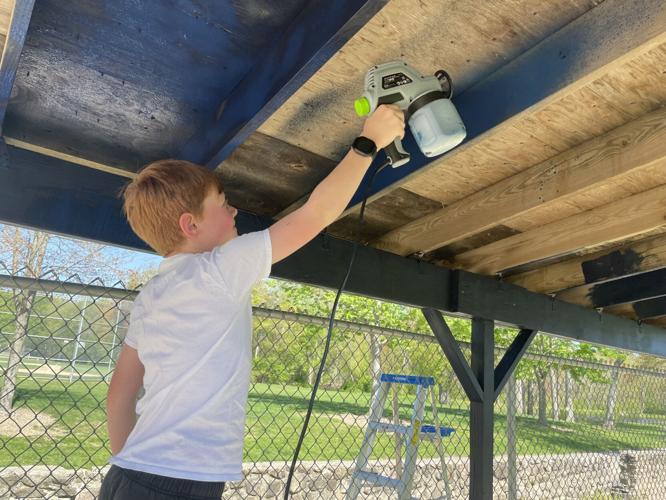 Volunteers spruce up baseball, softball dugouts in Foxboro Local News