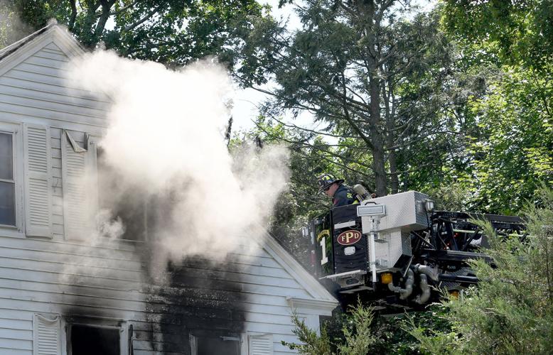 Passersby help woman get father out of burning Wrentham house Local News