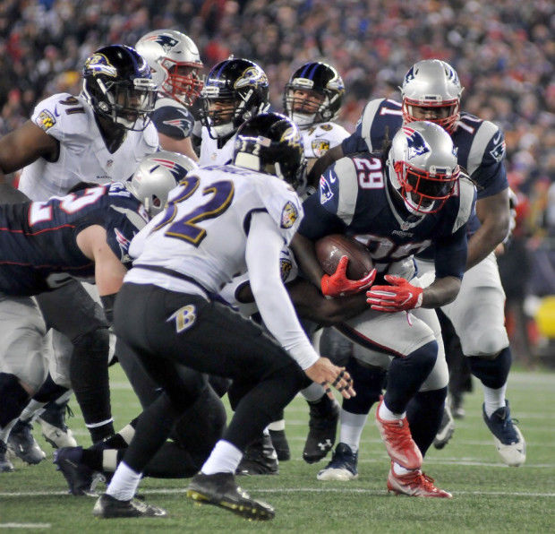 New England Patriots LeGarrette Blount celebrates with teammates after  scoring a 1-yard touchdown against the Baltimore Ravens in the first  quarter at M&T Bank Stadium in Baltimore, Maryland, December 22, 2013.  UPI/Kevin