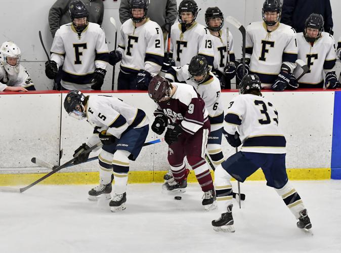 H.S. BOYS HOCKEY Foxboro rolls in preliminaryround action Local