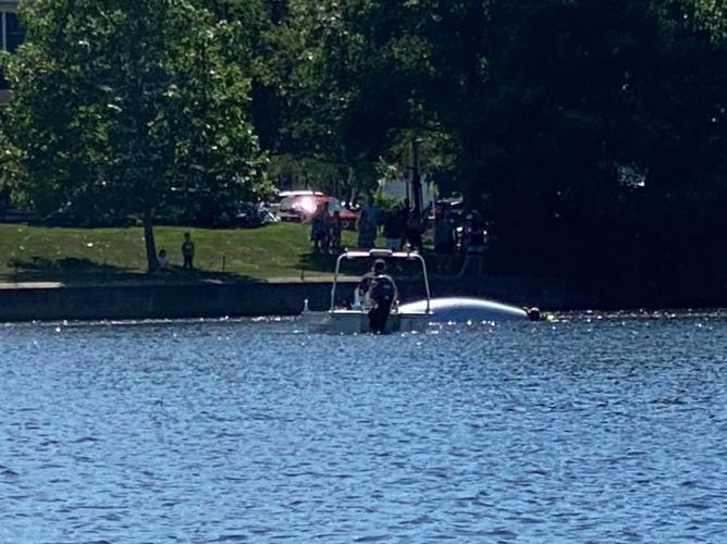 North Attleboro dive team recovers sail boat stuck in Falls Pond