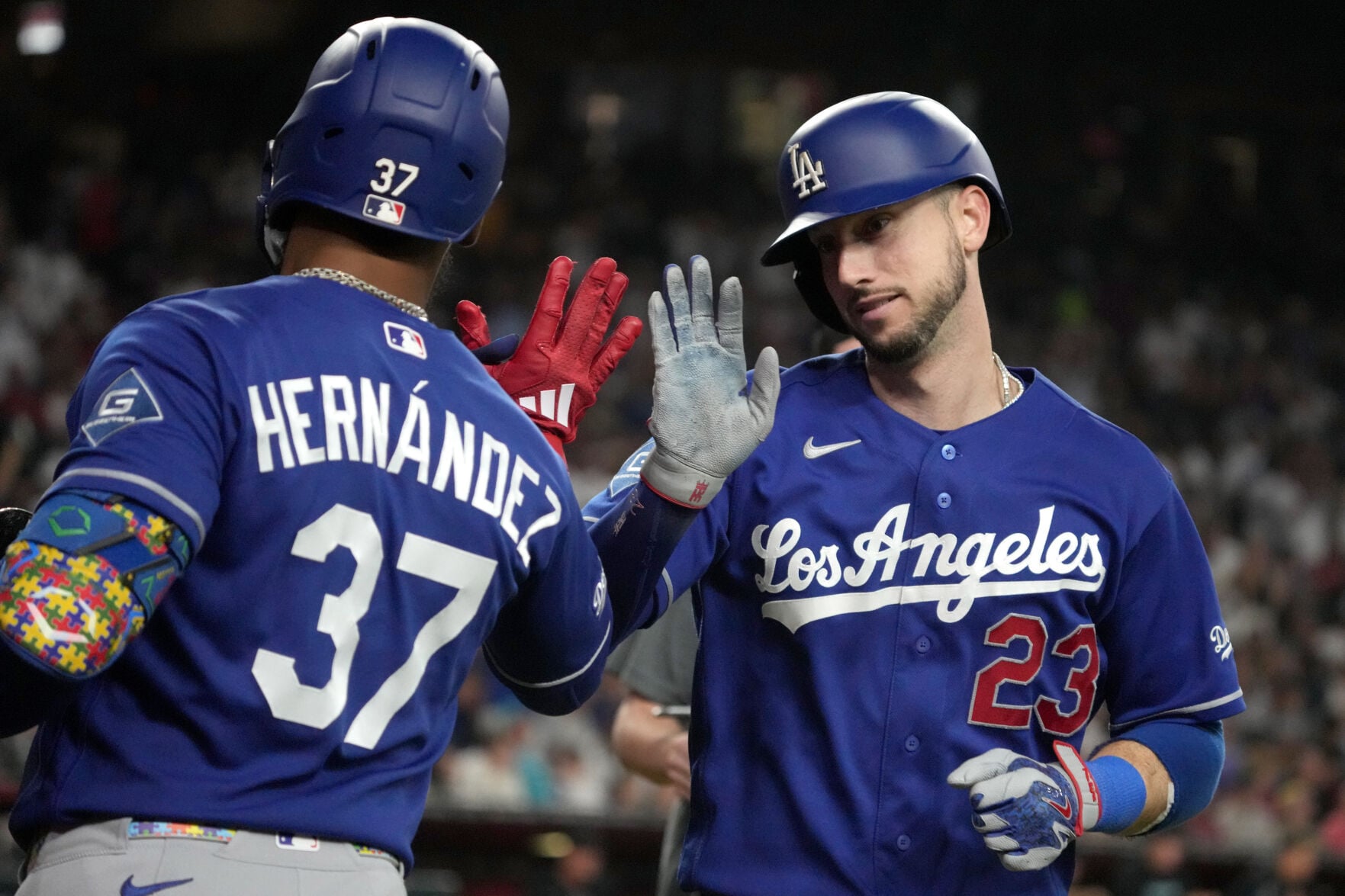 Dave Roberts manager looking intense on the bench during Dodgers vs Diamondbacks game