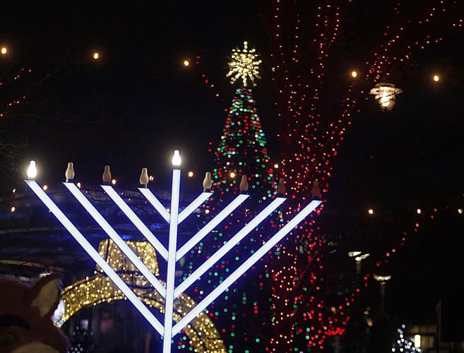 Lighting up the menorah at Patriot Place Gallery