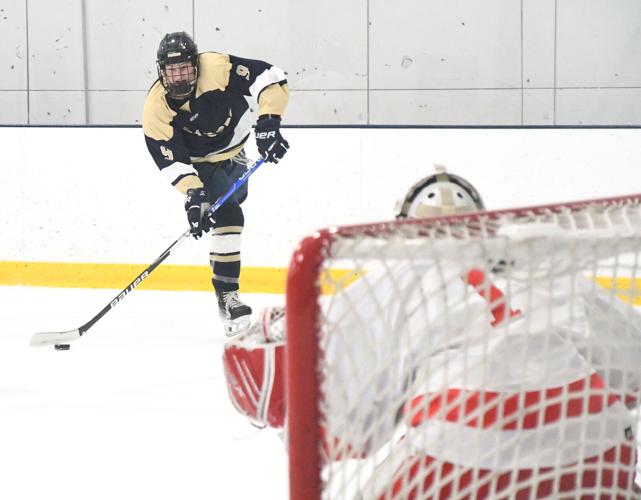 H.S. BOYS HOCKEY Lacroix, Foxboro turn back North Attleboro Sports
