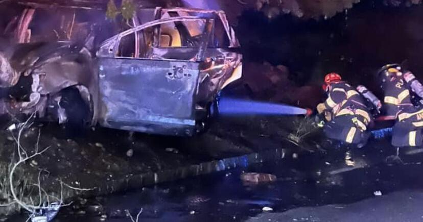 Driver escapes injury when car erupts in flames after hitting utility ...
