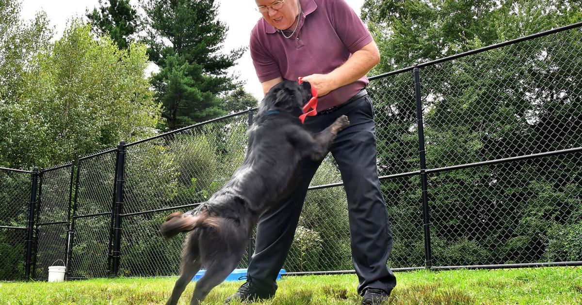 Longtime Mansfield animal control officer trades his leash for a traffic flag and garden gloves