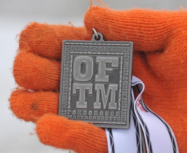 After snowy 3week delay, hundreds hit the streets of Foxboro for