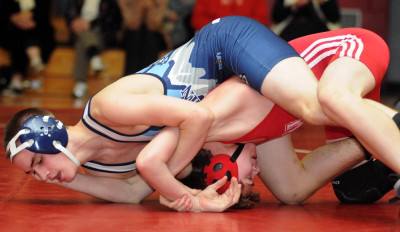 WRESTLING: Red Rocketeers get better of Norton