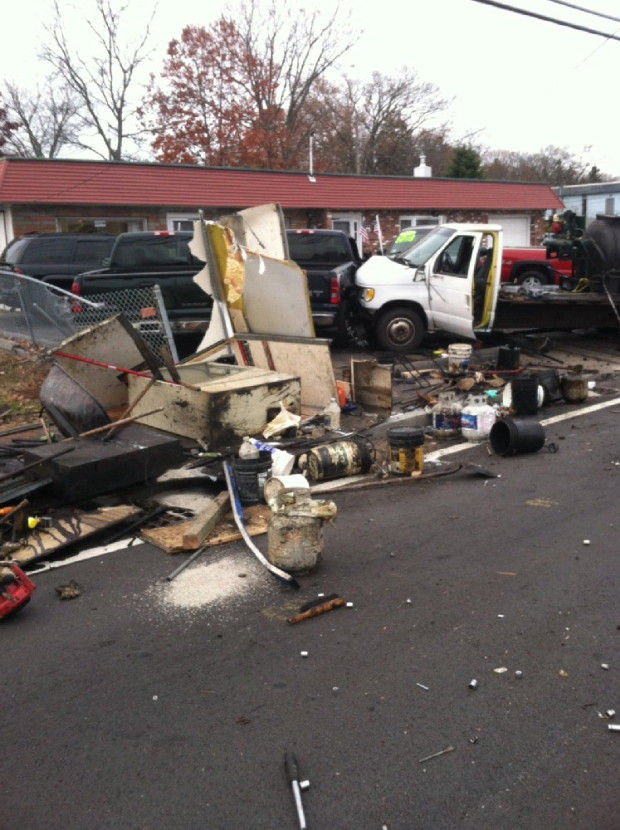 Box truck hits utility pole and parked pickup at North Attleboro dealership, shuts down two