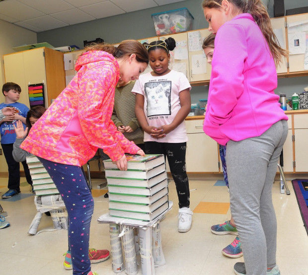 Wood School students make tables out of newspapers Schools