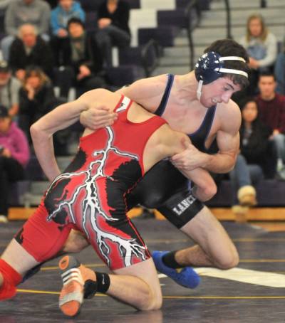 WRESTLING: Red Rocketeers get better of Norton