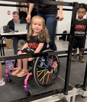 Foxboro girl models in New York fashion show highlighting adaptive wear