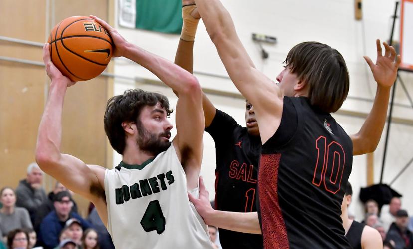 H.S. BOYS BASKETBALL Mansfield rides McCoy's 31 points, defensive