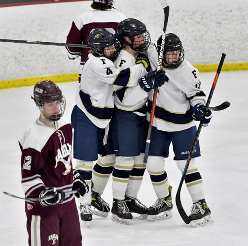 H.S. BOYS HOCKEY Foxboro rolls in preliminaryround action Local
