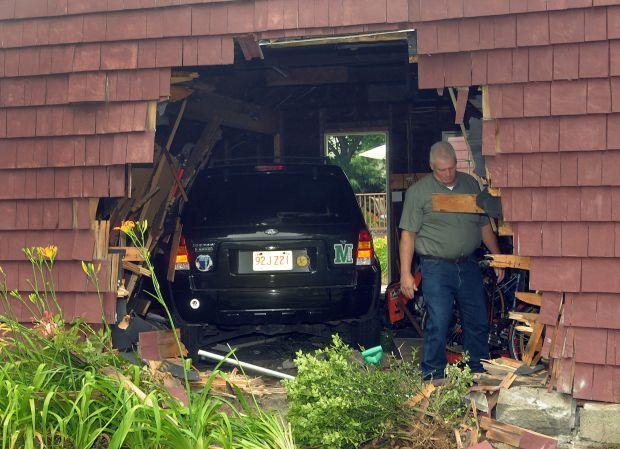 SUV crashes into Foxboro garage | Local News | thesunchronicle.com
