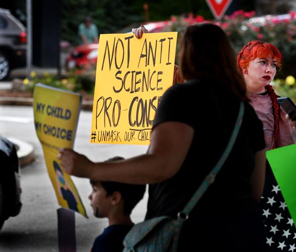 About two dozen protest in downtown Attleboro against mask mandate for ...