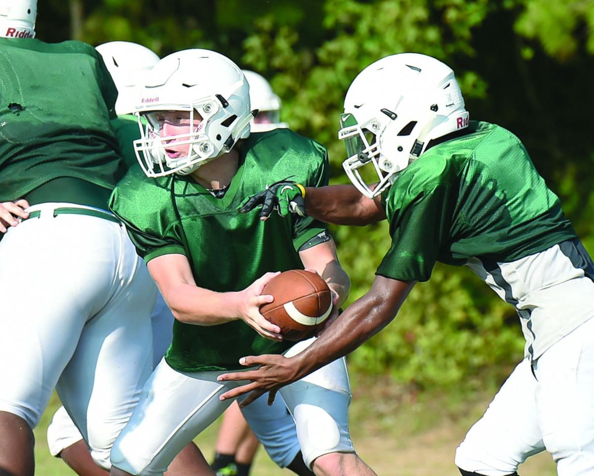 HIGH SCHOOL FOOTBALL Woodland working with new starters nearly