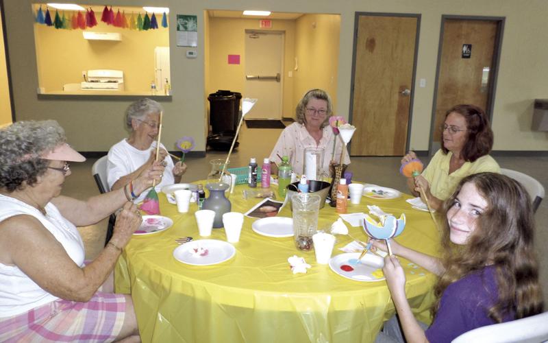 Class transforming gourds into art
