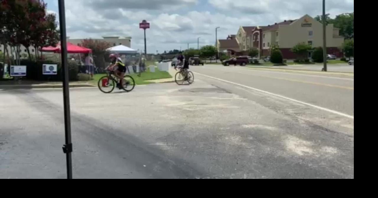 Cyclists arrive at the Orangeburg stop of the Ride to End ALZ