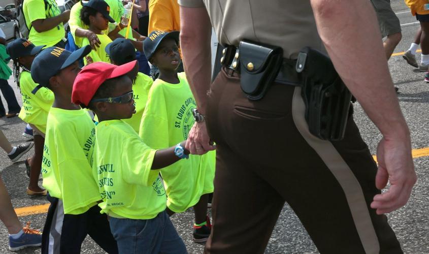 March marks two weeks since death of Michael Brown