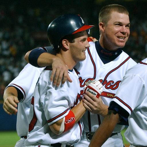 Former Atlanta Braves pitcher Greg Maddux reacts as his jersey is retired  before the Braves game against the New York Mets at Turner Field in  Atlanta, Georgia, Friday, July 17, 2009. (Photo