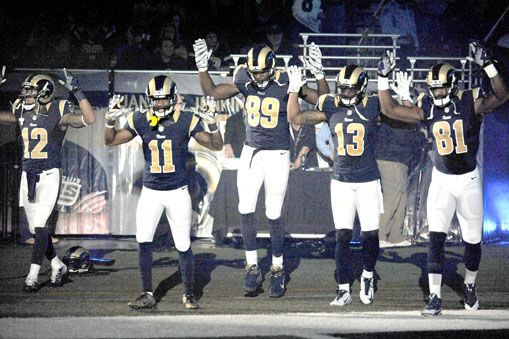 Ferguson protests: St. Louis Rams players use 'hands up, don't