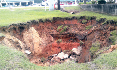 Sinking in Santee: Another sinkhole appears near Bank of Clarendon ...