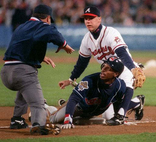 Atlanta Braves 1995 World Series champion teammates Chipper Jones, left,  and David Justice laugh before the third full squad spring training  baseball workout, Monday, Feb. 27, 2012, in Lake Buena Vista, Fla.