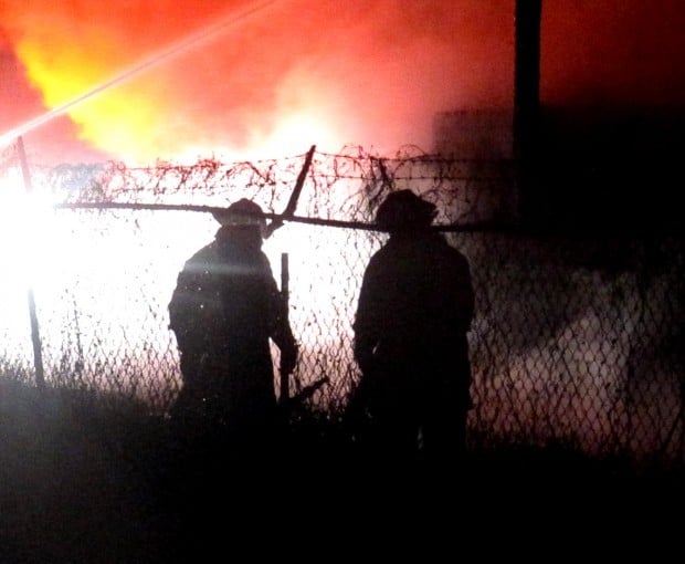 Flames engulf building in Vance