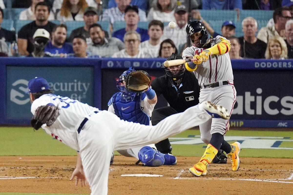 Ozuna's 30th home run leads Braves over Rockies 3-1 for 16th win in 21 games