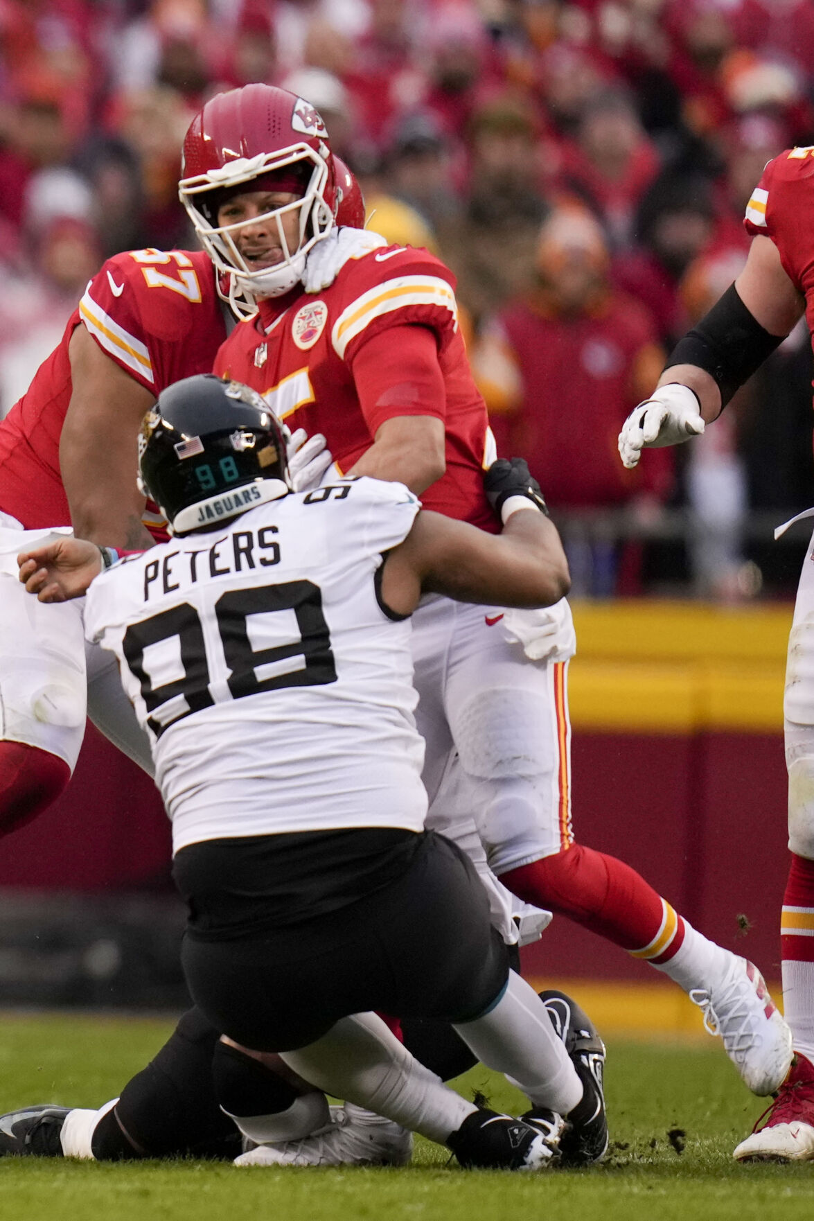 Kansas City Chiefs cornerback Jaylen Watson (35) celebrates an interception  against the Jacksonville Jaguars during an NFL Divisional Playoff football  game Saturday, Jan. 21, 2023, in Kansas City, Mo. (AP Photo/Ed Zurga