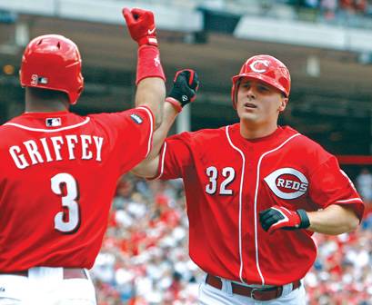 Cincinnatti Reds' Ken Griffey, Jr. can't catch the ball hit by