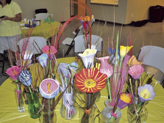 Class transforming gourds into art