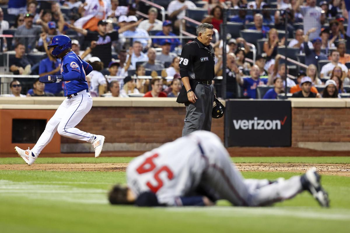 Dominant deGrom pitches surging Mets to 5-2 win over Braves