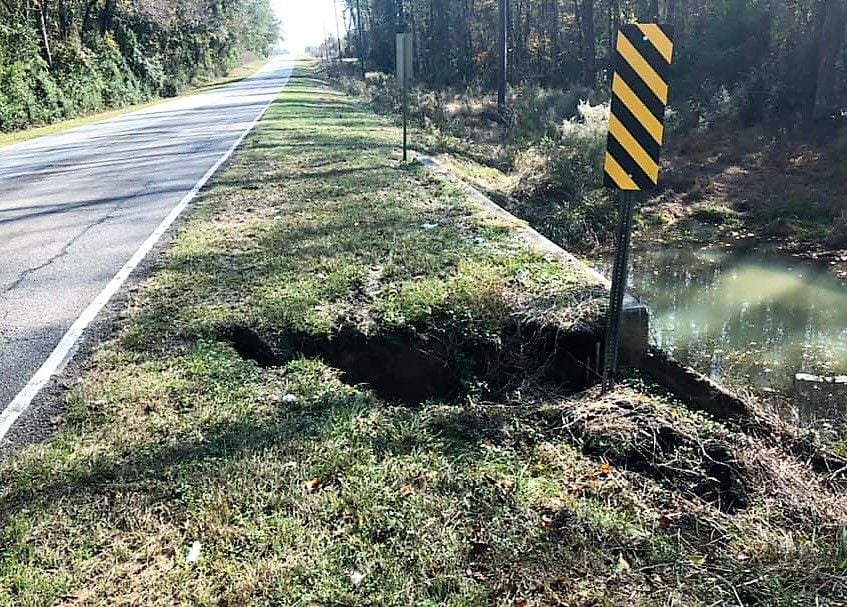 Water line break causes road shoulder to buckle Local