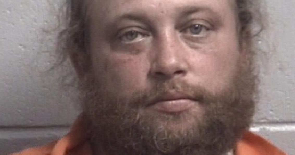 Man accused of attacking neighbor with machete