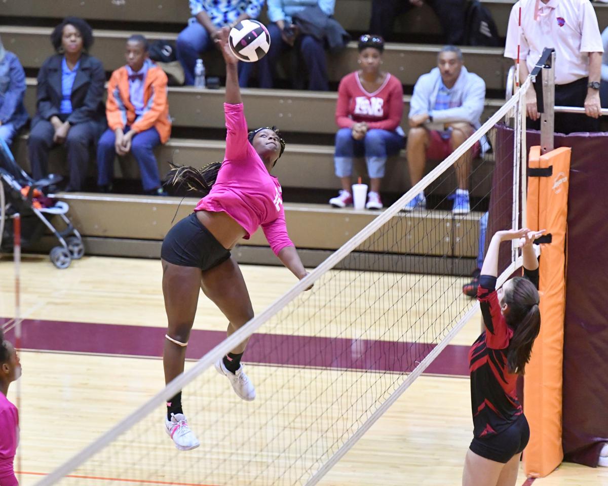 Berry swings on a kill in O-W volleyball win