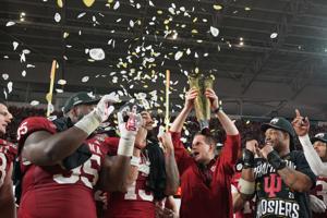 Hoosiers receive hero's welcome in return to Bloomington as football national champions